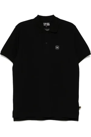 Izzue Playera tipo polo con parche del logo