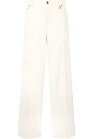 Roberto Cavalli Pantalones anchos con bolsillos en color crema