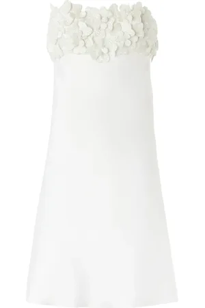 GENNY Vestido corto con aplique floral