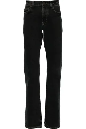 Saint Laurent Jeans con botones del logo