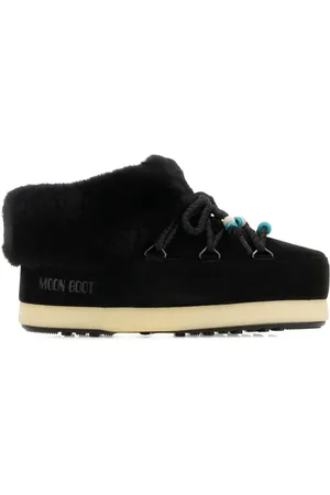 Moon Boot Mules con ribete de pelo