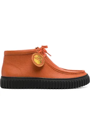 MARTINE ROSE Botas con agujetas y puntera redonda