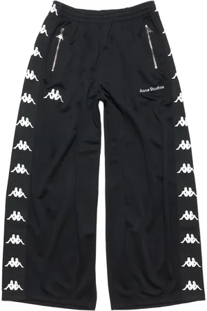 Acne Studios Pantalones holgados con logo estampado