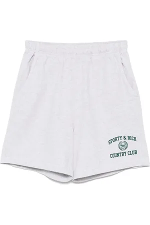 Sporty & Rich Shorts deportivos con distintivo universitario