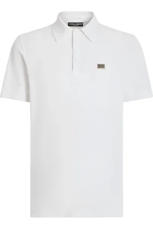 Dolce & Gabbana Playera tipo polo con placa del logo