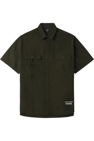 Comme des Garçons Camisa utility manga corta