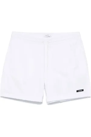 Calvin Klein Shorts de playa con parche del logo