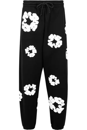 DENIM TEARS Pants con estampado Cotton Wreath