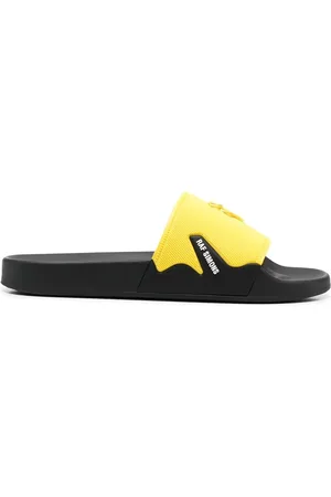 RAF SIMONS Flip flops con logo en relieve