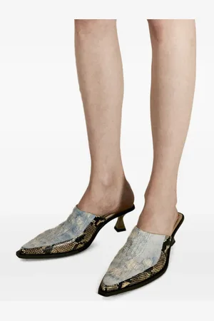 Eytys Mules con estampado de piel de serpiente