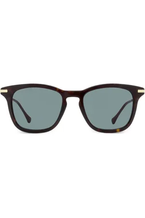 Gucci Lentes de sol con armazón cuadrada