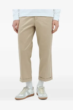 HUMAN MADE Pantalones capri con bolsillos