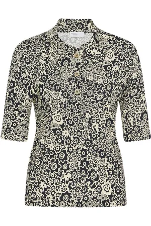 ROSETTA GETTY Playera tipo polo con estampado floral