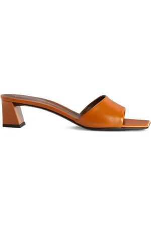 Giuseppe Zanotti Mules con tacón cuadrado