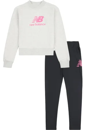 New Balance Set de pantalones con logo estampado