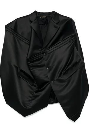 Comme des Garçons Chaleco deconstruido