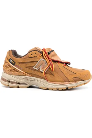 New Balance Tenis bajos 1906R con paneles