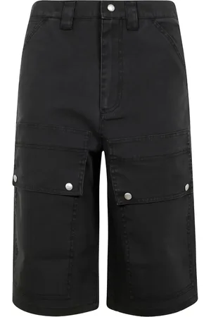 OAMC Shorts Peacemaker por las rodillas