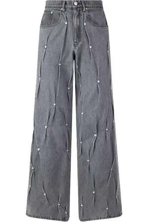 Kusikohc Jeans con múltiples remaches