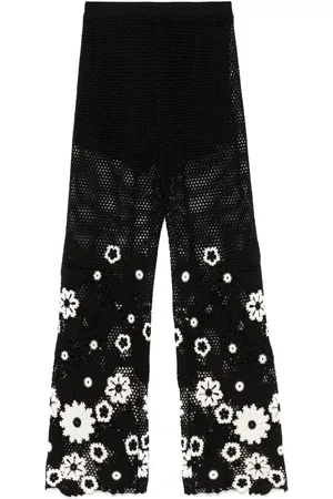 Maje Pantalones con bordado floral