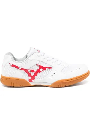 Comme des Garçons Tenis con estampado de lunares de COMME DES GARÇONS GIRL x Mizuno