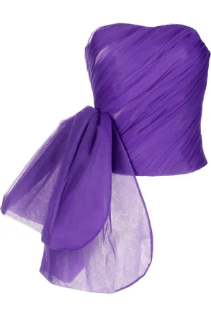 ANOUKI Top strapless con moño oversize