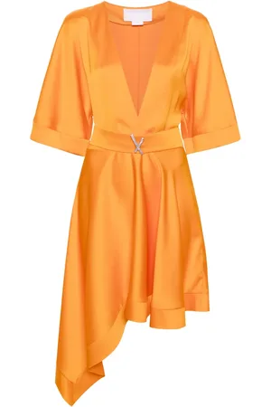 GENNY Vestido corto asimétrico con cinturón