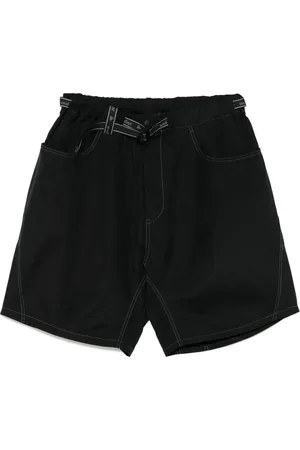 and wander Shorts con cinturón