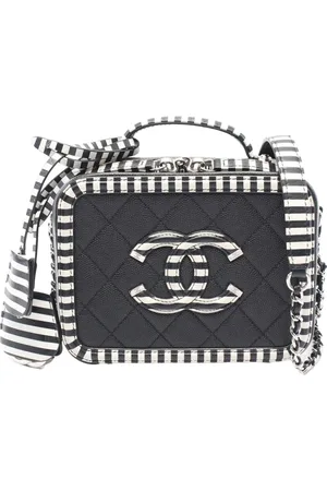 CHANEL Cosmetiquera Case en filigrama de piel caviar a rayas con logo CC 2019