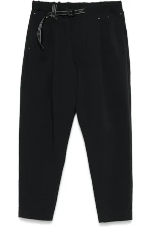 and wander Pantalones con correa ajustable