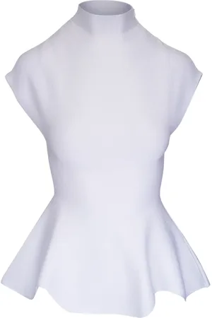 Khaite Blusa con peplum