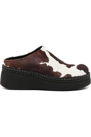 Miista Mules Kristi con estampado de vaca