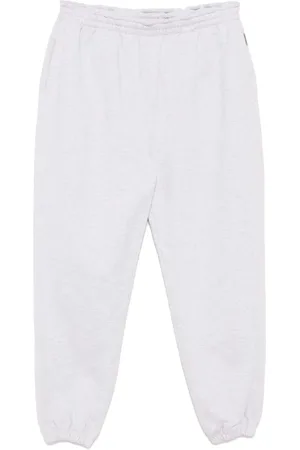Represent Pants con inicial en los tobillos