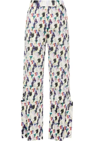 HENRIK VIBSKOV Pantalones plisados con estampado floral
