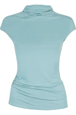 Paris Georgia Blusa con dobladillo asimétrico