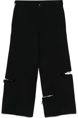 Comme des Garçons Pantalones con efecto envejecido