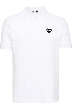 Comme des Garçons Playera tipo polo con parche de corazón