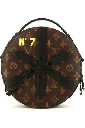 LOUIS VUITTON Bolsa circular con monograma