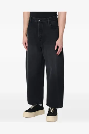 STUDIO NICHOLSON Pantalones con parche del logo