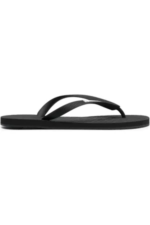 Vetements Flip flops con motivo en relieve