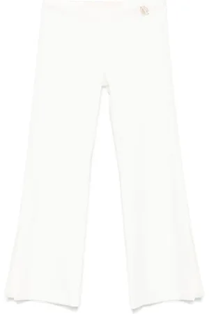 MISS BLUMARINE Pantalones con placa del logo