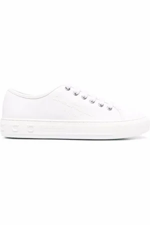 Salvatore Ferragamo Tenis bajos con logo en relieve