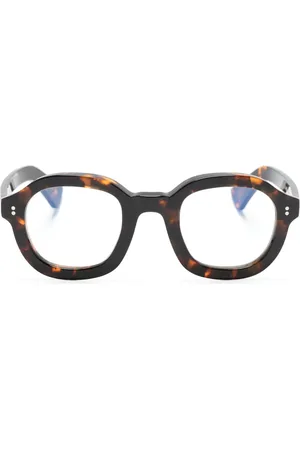 LESCA Lentes con armazón redonda estilo carey