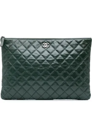CHANEL Bolso de mano O Case grande acolchado de charol tornasolado 2014