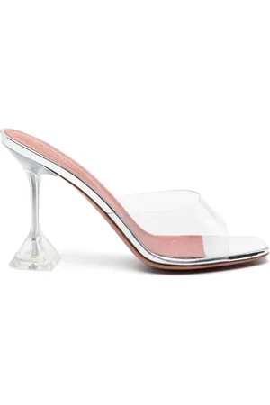 Amina Muaddi Mules Lupita Glass con tacón transparente de 95mm
