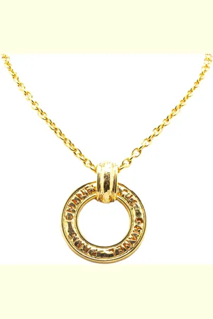CHANEL Collar bañado en oro con dije circular con logo 1970-1980
