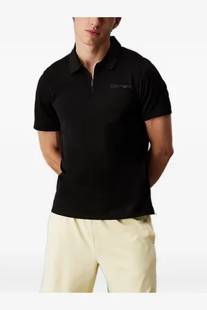 Calvin Klein Playera tipo polo con detalles del logo