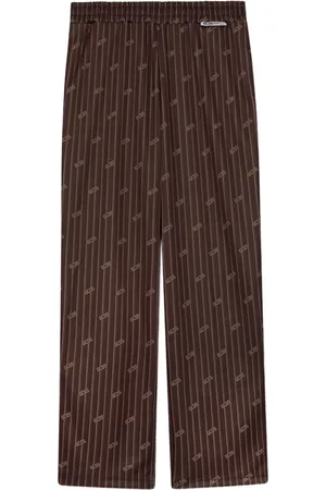 GCDS Pants con rayas diplomáticas estampadas