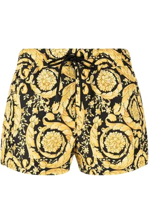 VERSACE Shorts de playa con estampado Barocco