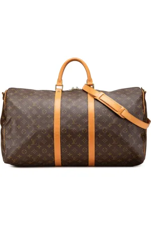 LOUIS VUITTON 1994 Monogram Keepall Bandouliere 55 travel bag